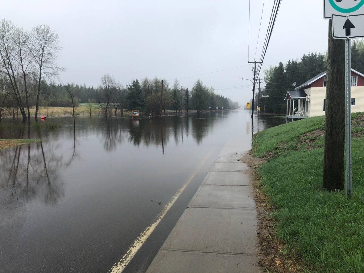 Some streets in Girardville, a small town in the Saguenay-Lac-Saint-Jean area, were closed off on Tuesday because of minor flooding. (Andréanne Larouche/Radio-Canada) ( - image credit)