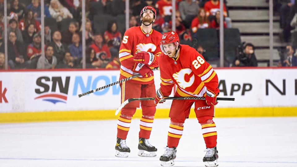 Flames players Elias Lindholm (28) and Noah Hanifin (55) might see their names appear in trade rumors in the coming months. (Photo by Brett Holmes/Icon Sportswire via Getty Images)