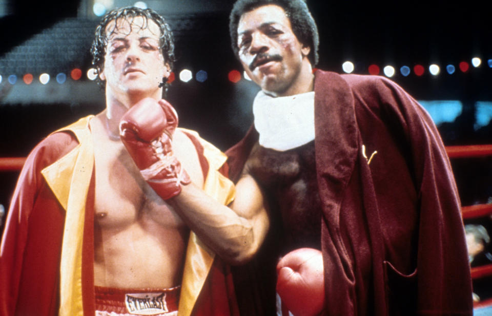 Sylvester Stallone and Carl Weathers on set of the film 'Rocky', 1976. (Photo by United Artists/Getty Images)