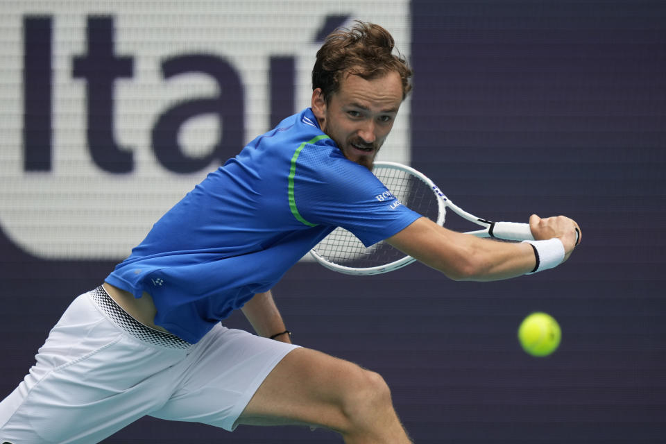 Daniil Medvedev returns a ball against Christopher Eubanks in their quarterfinal match at the Miami Open tennis tournament, Thursday, March 30, 2023, in Miami Gardens, Fla. (AP Photo/Rebecca Blackwell)