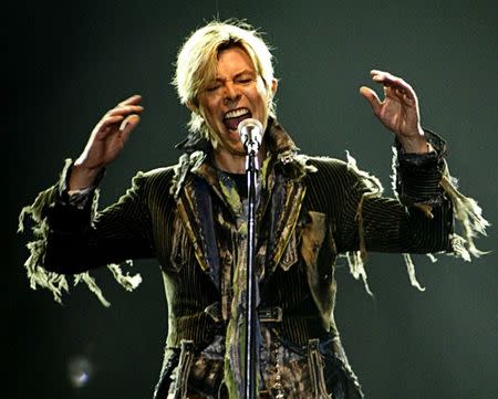 File photo: British singer David Bowie performs in a concert during his worldwide tour called "A Reality Tour" at T-mobile arena in Prague, June 23, 2004. REUTERS/David W Cerny/Files