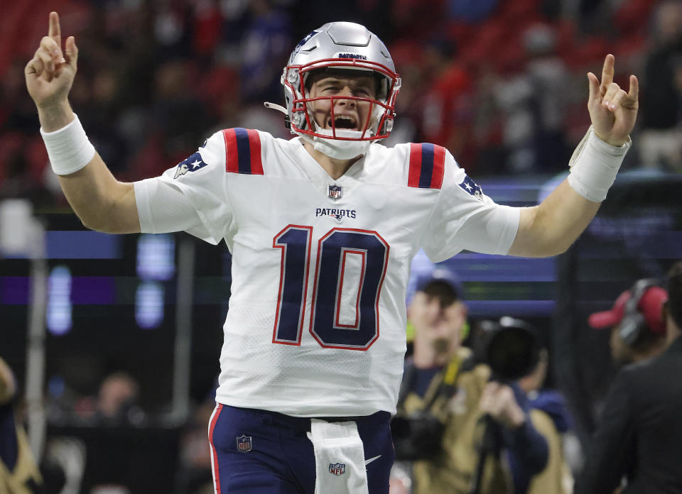 Atlanta, GA - November 18: New England Patriots QB Mac Jones pumping up his fans before the game. The New England Patriots visit the Atlanta Falcons in a regular season NFL game at Mercedes-Benz Stadium in Atlanta, GA on Nov. 18, 2021. (Photo by Matthew J. Lee/The Boston Globe via Getty Images)