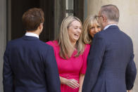 French President Emmanuel Macron, left, Australian Prime Minister Anthony Albanese's partner Jodie Haydon, Emmanuel Macron's wife Brigitte Macron, second right, and Australian Prime Minister Anthony Albanese share a laugh Friday, July 1, 2022 at the Elysee Palace in Paris. Australia and France opened a "new chapter" in relations as the new Australian prime minister seeks to heal wounds caused by a secret submarine contract that infuriated France. (AP Photo/ Thomas Padilla)