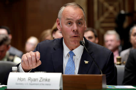 FILE PHOTO: U.S. Interior Secretary Ryan Zinke testifies before a Senate Appropriations Interior, Environment and Related Agencies Subcommittee hearing on the FY2019 funding request and budget justification for the Interior Department, on Capitol Hill in Washington, U.S., May 10, 2018. REUTERS/Yuri Gripas/File Photo