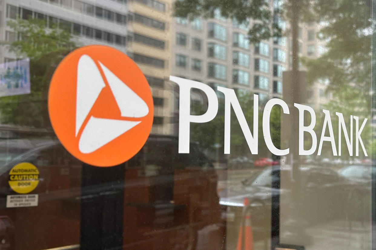 The logo of PNC Bank, a subsidiary of PNC Financial Services Group, is seen on the window of a branch in Washington, U.S. April 30, 2023.  REUTERS/Ashraf Fahim