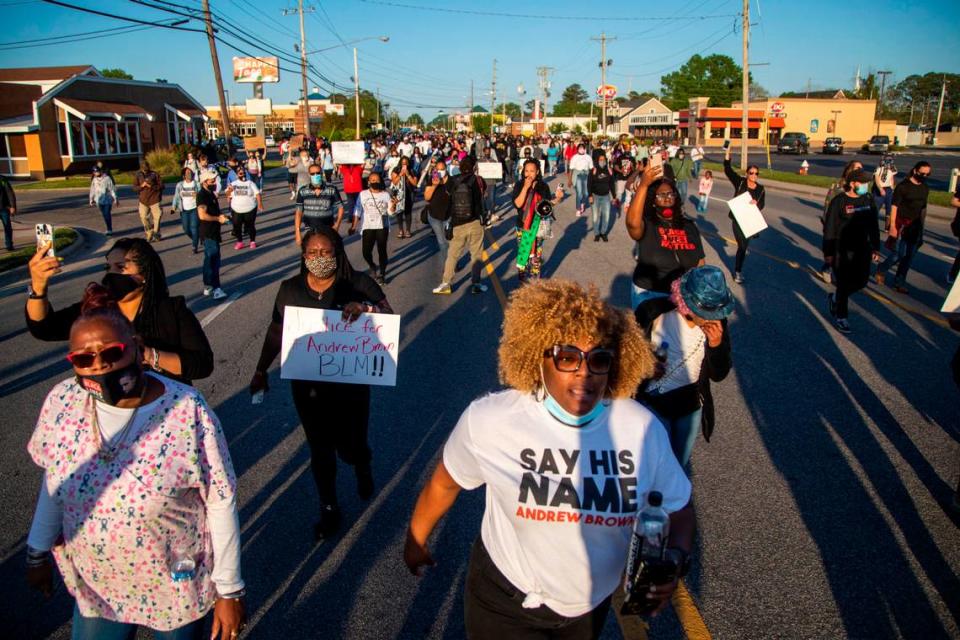 Demonstrators march peacefully in Elizabeth City on Monday April 26, 2021 after family viewed 20 seconds of police body camera video of the shooting death of Andrew Brown Jr.