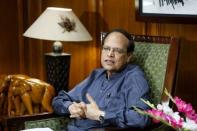 Bangladesh's central bank Governor Atiur Rahman talks during an interview inside his office in Dhaka October 2, 2013. REUTERS/Andrew Biraj