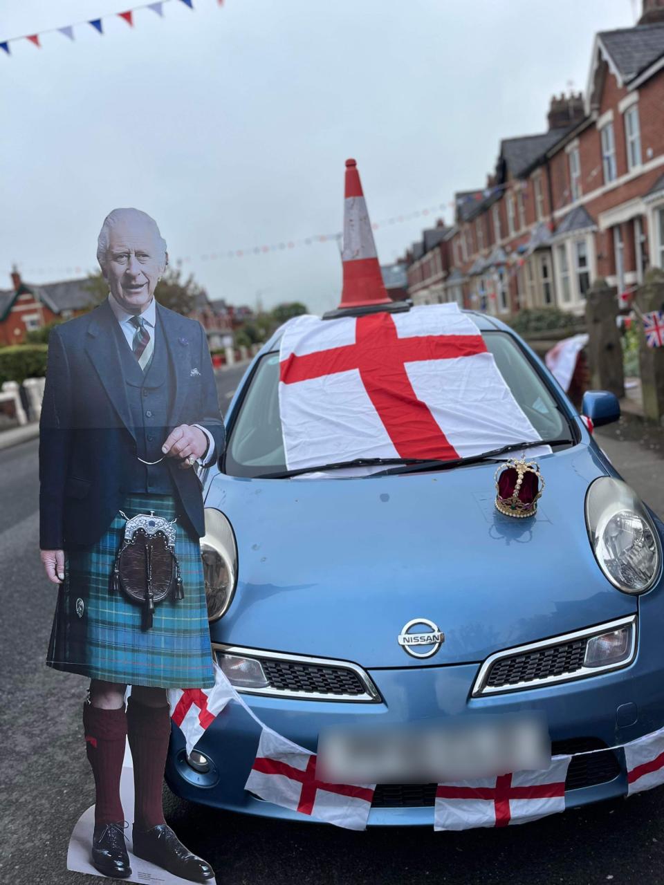 A street party was held to celebrate the coronation of King Charles, and residents asked that cars be removed in advance. (Kennedy)