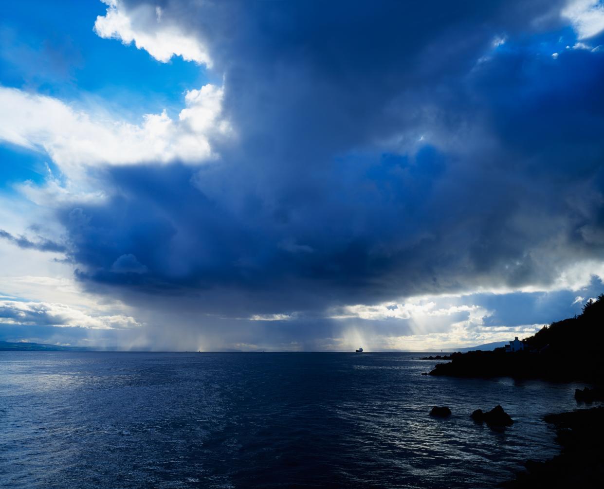 Rain shower over Lough Foyle from Greencastle, Co Donegal, Ireland