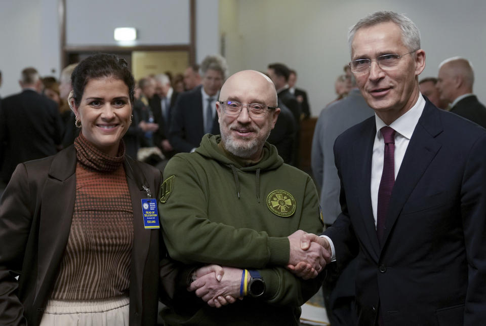 From left, Iceland's Foreign Minister Thordis Kolbrun Reykfjord Gylfadottir, Ukrainian Defense Minister Oleksii Reznikov and Secretary General of NATO, Jens Stoltenberg, pose for a photo prior to the meeting of the 'Ukraine Defense Contact Group' at Ramstein Air Base in Ramstein, Germany, Friday, Jan. 20, 2023. Defense leaders are gathering at Ramstein Air Base in Germany Friday to hammer out future military aid to Ukraine, amid ongoing dissent over who will provide the battle tanks that Ukrainian leaders say they desperately need(AP Photo/Michael Probst)