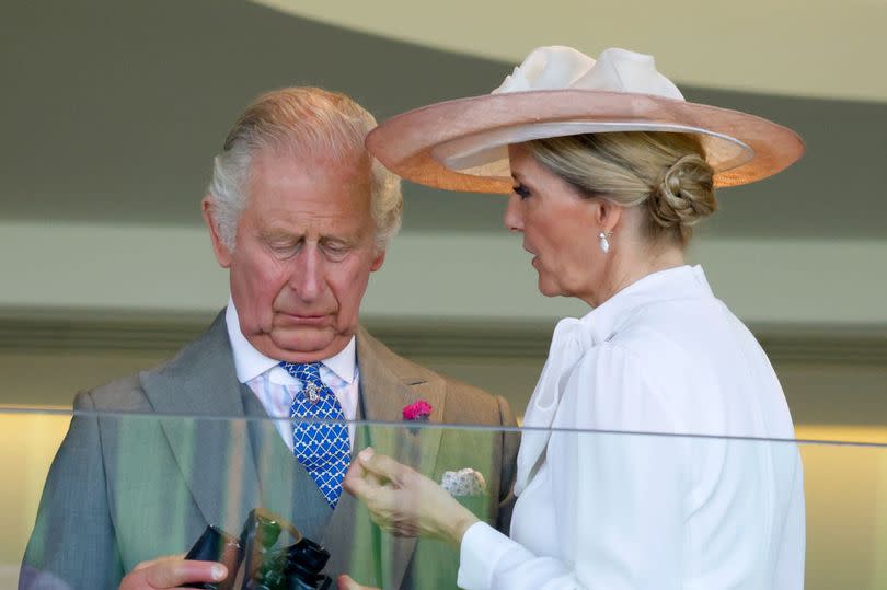 King Charles III and Sophie, Duchess of Edinburgh watch his horse 'Circle of Fire' run in 'The Queen's Vase' on day 2 of Royal Ascot 2023 at Ascot Racecourse on June 21, 2023 in Ascot, England.