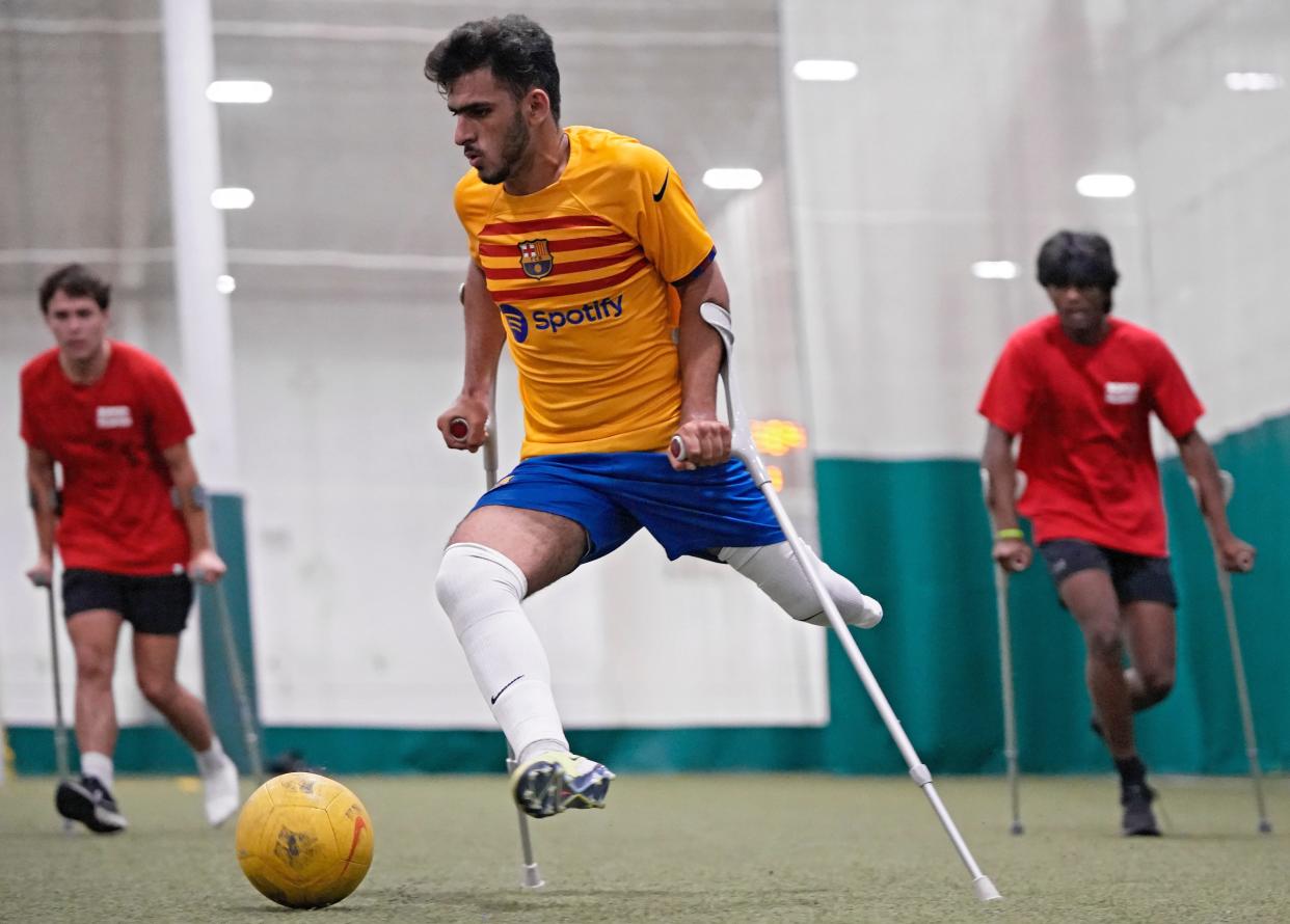 Abdullah Mukhaimer, 16, plays with the Adaptive Sports Connection's amputee soccer team at the TOCA Soccer center in Lewis Center on July 10.