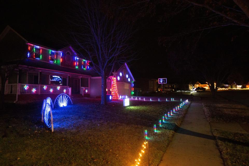 Evans Christmas Lights, 4300 S.E Michigan Ave., show a vibrant change of pace to traditional displays by using programmed lights and monitors to show unique graphics synchronized to music.