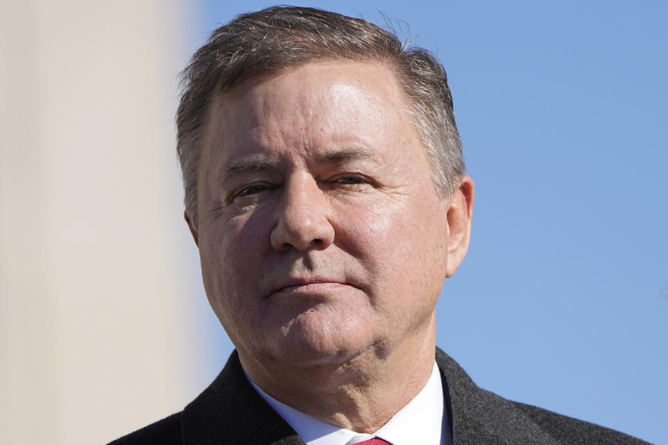 FILE - Oklahoma Attorney General Gentner Drummond stands during the playing of the national anthem at the inauguration ceremonies on Jan. 9, 2023, in Oklahoma City. Drummond plans to ask the state's Pardon and Parole Board on Wednesday, April 26, to recommend sparing the life of death row inmate Richard Glossip, a highly unusual move for the state's top prosecutor's office that typically urges the board to reject clemency. (AP Photo/Sue Ogrocki, File)