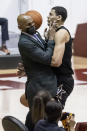 Vanderbilt forward Dylan Disu (1) collides with Vanderbilt head coach Stackhouse while chasing a long inbounds pass during the second half of an NCAA basketball game against Alabama on Saturday, Feb. 20, 2021, in Tuscaloosa, Ala. (AP Photo/Vasha Hunt)