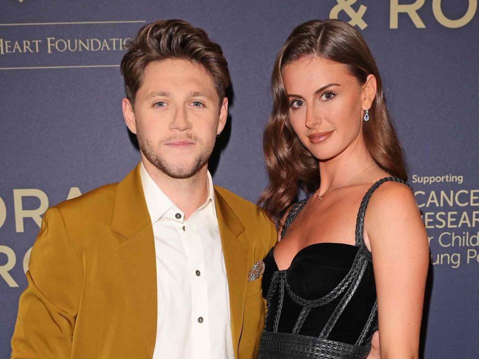 David M. Benett/Dave Benett/Getty Niall Horan and Mia Woolley attend the Horan & Rose Show: Modest! Golf co-founder Niall Horan and Justin Rose brought the world of music and sport together at The Grove, presenting an evening of entertainment to raise money for The Black Heart Foundation on September 03, 2021 in Watford, England.