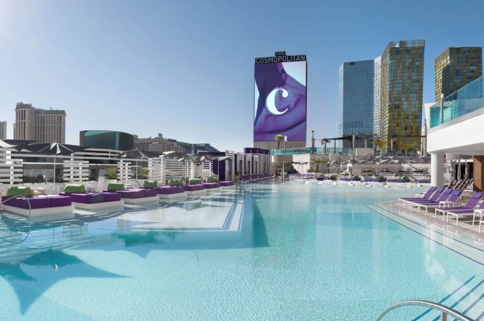 <p><strong>Let’s start big picture.</strong><br> <a href="https://www.cntraveler.com/hotels/united-states/las-vegas/the-cosmopolitan-of-las-vegas?mbid=synd_yahoo_rss" rel="nofollow noopener" target="_blank" data-ylk="slk:Cosmopolitan;elm:context_link;itc:0;sec:content-canvas" class="link ">Cosmopolitan</a> has three pool areas, and Boulevard Pool is the largest, with unobstructed fourth-story views of The Strip. The pool itself is multi-level, with cabanas, daybeds, bars, and poolside noshes. You don't need to book in advance, but you do need to be a guest of the hotel to use the pool during the daytime.</p> <p><strong>Any standout features or must-sees?</strong><br> This isn't just any pool—it's a programmed-to-the-hilt public space offering fun brunches, evening film screenings, and even concerts that transform the pool deck into a sweaty, 3,000-person venue.</p> <p><strong>Was it easy to get around?</strong><br> Boulevard Pool is huge, but it's easy to navigate. There's a lot of security, so if you've booked a cabana or special seats for one of the concerts, you'll have no problem finding where you need to be (and keeping others out).</p> <p><strong>All said and done, what—and who—is this best for?</strong><br> There's an experience here for everyone. In the winter, the pool is transformed into a massive ice rink, where you can roast marshmallows over an open fire and order adult hot chocolate (also kid-friendly.) In the summer, the bars in one fun, hot, sweaty dance party and those who book cabanas or special seating can get bottle service and a great view of the stage.</p>