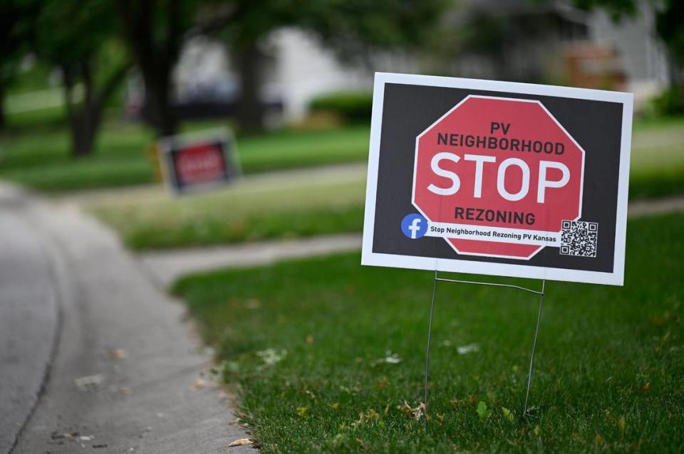 “Stop Rezoning” signs have been cropping up in yards across Prairie Village, as neighbors protest the city’s idea to amend zoning laws to allow for more duplexes, apartment buildings and townhomes. Tammy Ljungblad/tljungblad@kcstar.com