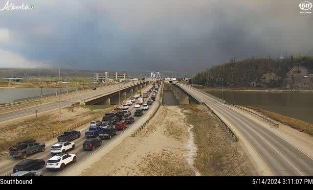 A highway camera photo shows traffic in FortMcMurray jammed in the southbound lane of Highway 63 on the north side of the Athabasca River. The image was captured at 3:11 p.m. MT, about an hour after an evacuation order was issued for four neighbourhoods. 