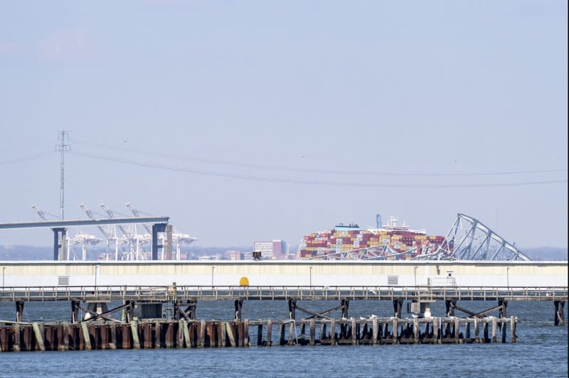 The Dali cargo vessel is seen from shore Friday following the collapse of the Francis Scott Key Bridge in Baltimore, Md. Photo by Bonnie Cash/UPI