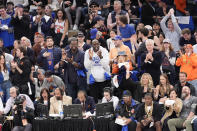 New York Knicks fans cheer during the first half in Game 1 of an NBA basketball first-round playoff series against the Philadelphia 76ers, Saturday, April 20, 2024, at Madison Square Garden in New York. (AP Photo/Mary Altaffer)