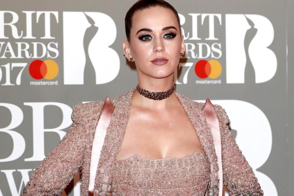 Awkward? Katy Perry and Dan Smith had a chat on the red carpet: Getty Images