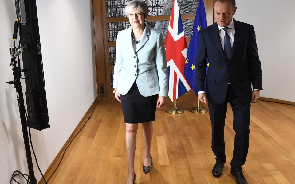 Prime Minister Theresa May and European Council President Donald Tusk - AFP