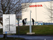 Members of media stand outside the Honda car plant in Swindon, Britain, February 18, 2019. REUTERS/Eddie Keogh