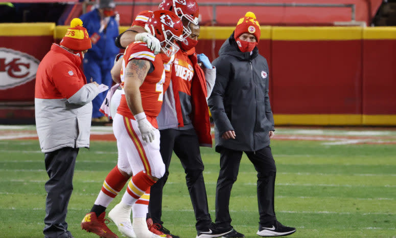 Eric Fisher gets helped off of the field.