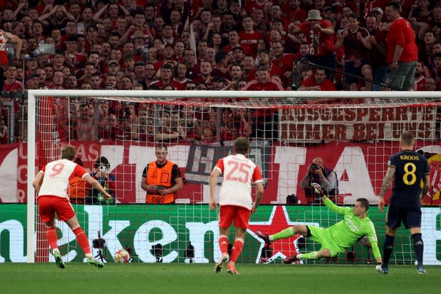 Harry Kane, left, scores from a penalty against Real Madrid