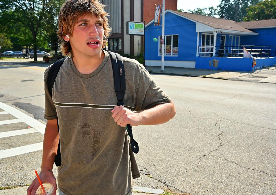 Clark University junior Siman Pinchbeck walks in Main South.