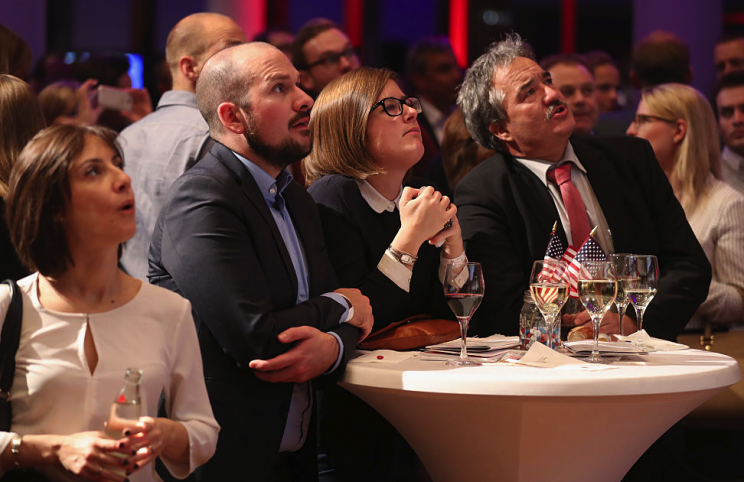 Crowds gather at an election party in Germany (Picture: AP