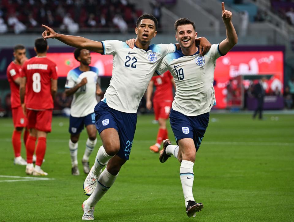 Jude Bellingham front, L of England celebrates with teammate Mason Mount after scoring during the Group B match between England and Iran at the 2022 FIFA World Cup at Khalifa International Stadium in Doha, Qatar, Nov. 21, 2022. (Photo by Li Ga/Xinhua via Getty Images)