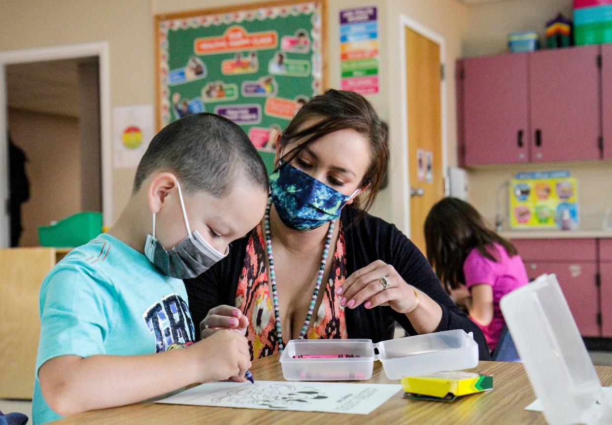 Amy Deroche, immersion teacher at KW/Vina Elementary School in Browning, talks with kindergartner Noah McClure during class on Tuesday, August 24, 2021.