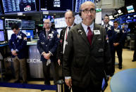 <p>Traders pause during a moment of silence for the victims of yesterday’s church shooting in Texas on the floor of the New York Stock Exchange in New York City, Nov. 6,2017. (Photo: Justin Lane/EPA-EFE/REX/Shutterstock) </p>