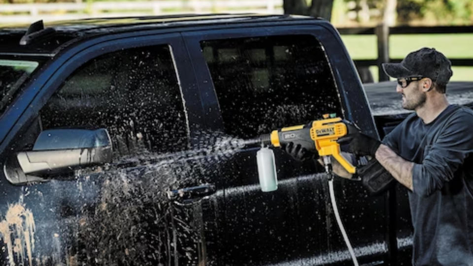 Truck cleaned with cordless pressure washer