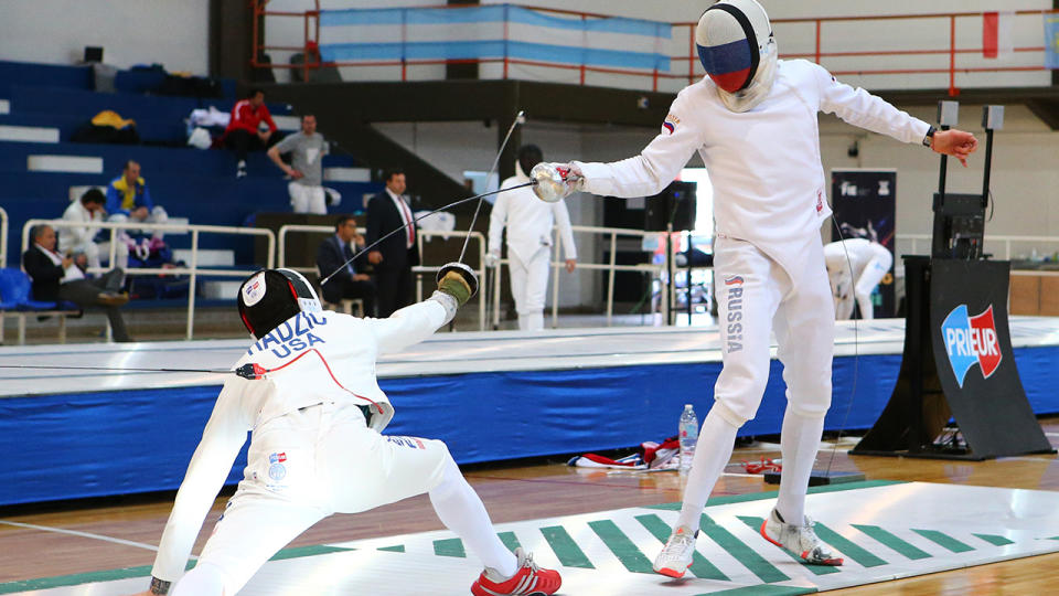 Alen Hadzic, pictured here in action against Vadim Anokhin at the Men's Epee World Cup in 2019. 