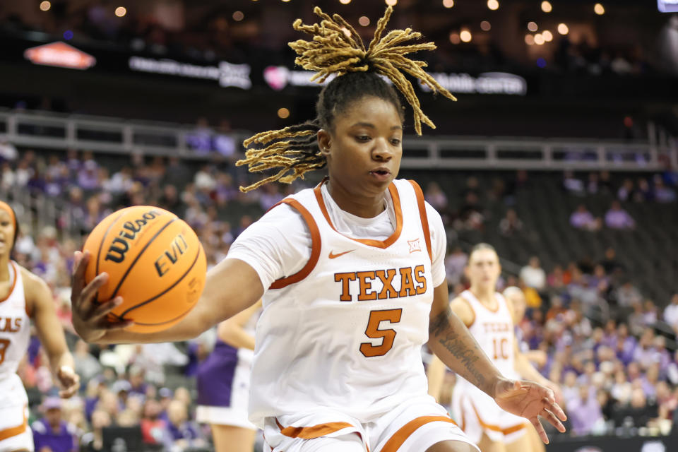 Texas Longhorns forward DeYona Gaston (5) saves a loose ball in the fourth quarter of a women's Big 12 tournament semifinal game between the Kansas State Wildcats and Texas Longhorns on Mar 11, 2024 at T-Mobile Center in Kansas City, MO. (Photo by Scott Winters/Icon Sportswire via Getty Images)