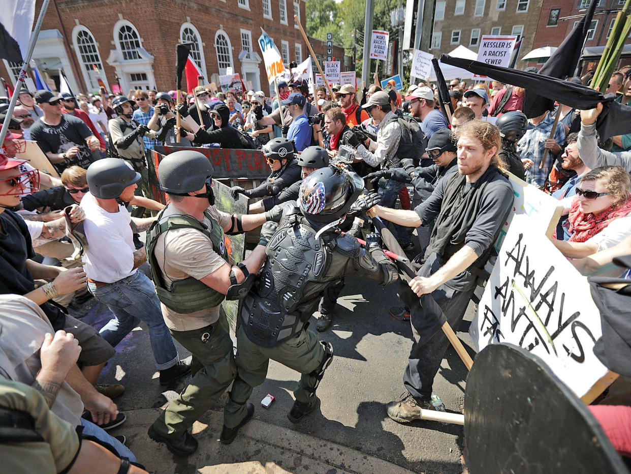 Pressure grew on tech firms to stop giving hate a platform after revulsion at far-right demonstrations in Charlottesville over the weekend: Getty