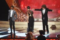 <p>Actors Caleb McLaughlin, Millie Bobby Brown, and Gaten Matarazzo, of the Netflix hit <em>Stranger Things, </em>perform on stage.</p>