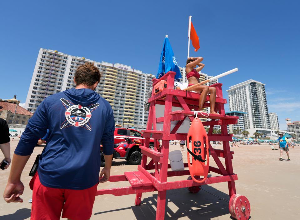 Ocean Rescue Lifeguards watch the water after responding to a call in Daytona Beach, Saturday, May 4, 2024.