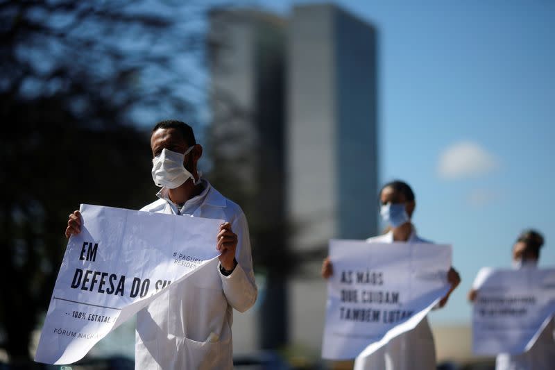 Resident doctors protest against the lack of salaries' payment in front of the Ministry of Health, amid the coronavirus disease (COVID-19) outbreak, in Brasilia