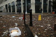 Debris litters a flooded street in the Dumbo section of Brooklyn after the city awakens to the affects of Hurricane Sandy on October 30, 2012 in New York. (Spencer Platt/Getty Images)