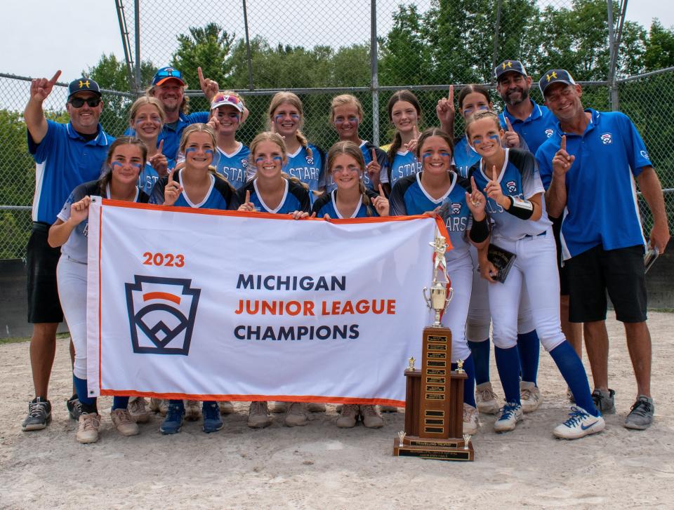 The Hudsonville/Georgetown Little League Junior Softball Team celebrates its regional championship.