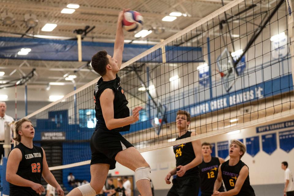 Calhoun Christian/Harper Creek co-op senior Nico Gummer (Calhoun Christian) hits the ball during a game at Harper Crreek on Wednesday, May 3, 2023.