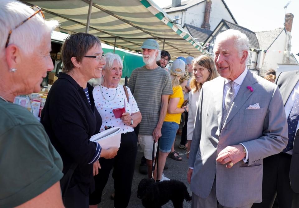 Prince Charles, Prince of Wales meets with members of the public during a visit to Hay Castle