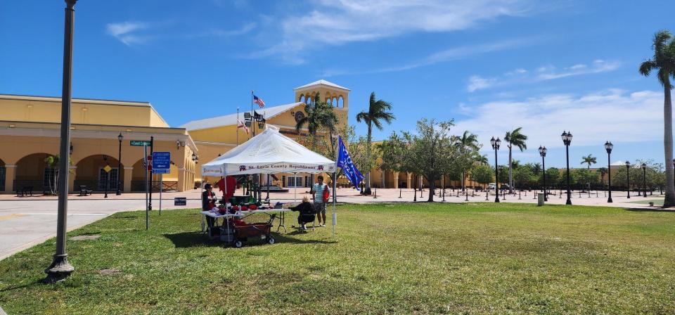 The Mid Florida Event Center serves as precinct March 19, 2024, for Tuesday's Presidential Preference Primary in Port St. Lucie. St. Lucie County Republican officials are outside with merchandise for former President Donald Trump, who is the only Republican candidate still in the race.