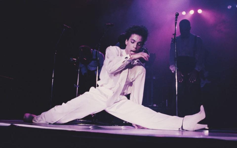 Prince on stage on the Hit N Run-Parade Tour at Wembley Arena in August 1986 - Getty