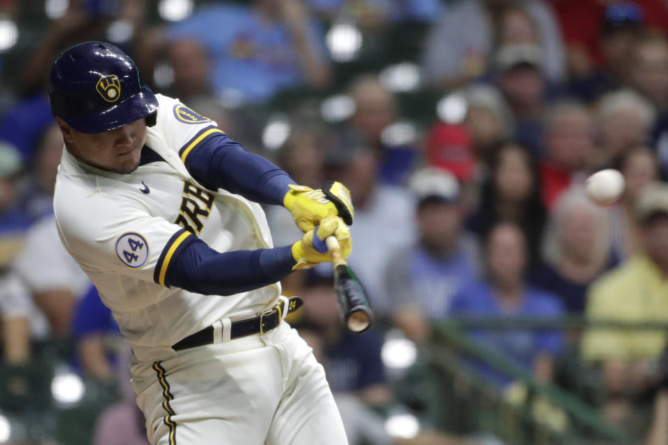 FILE - Milwaukee Brewers' Avisail Garcia hits a solo home run during the second inning of a baseball game against the St. Louis Cardinals, Monday, Sept. 20, 2021, in Milwaukee. The Miami Marlins are finalizing an extension with right-hander Sandy Alcantara and have reached an agreement with free agent outfielder Avisail Garcia, a person with knowledge of the situations said Sunday, Nov. 28. (AP Photo/Aaron Gash, File)