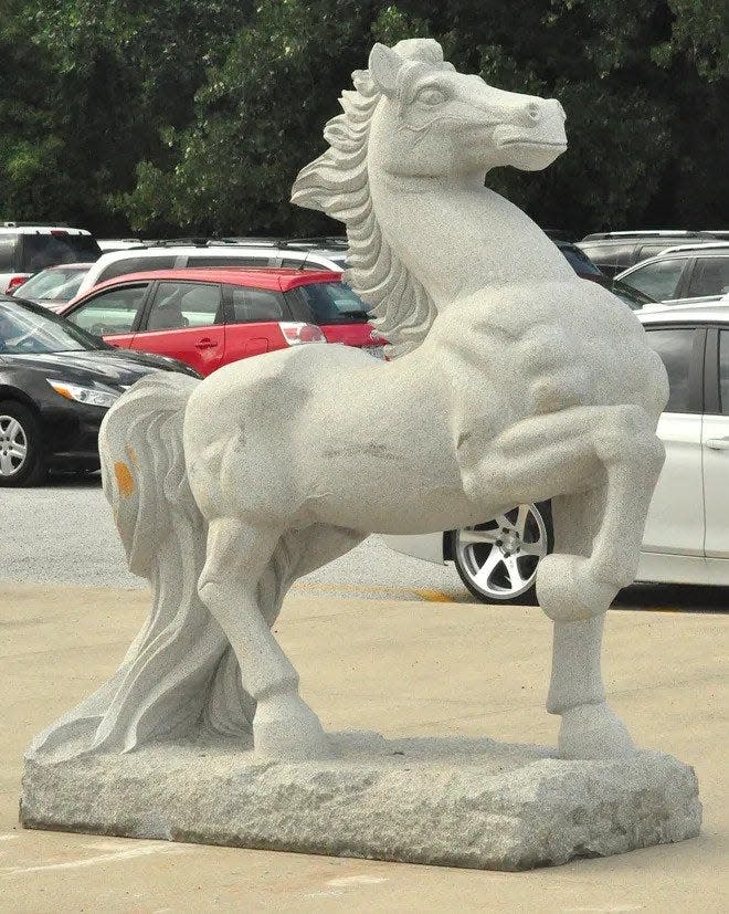 A granite horse that once greeted diners at a Chinese buffet in Macedonia stands tall at Boliantz Stadium at Nordonia High School.